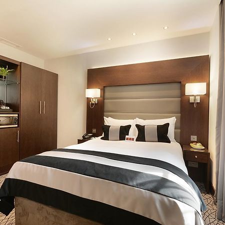 Park Grand London Lancaster Gate Londres Exterior foto A bedroom at the hotel