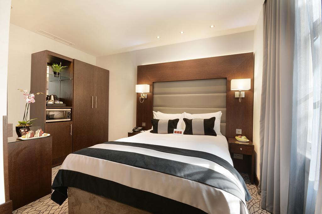 Park Grand London Lancaster Gate Londres Exterior foto A bedroom at the hotel