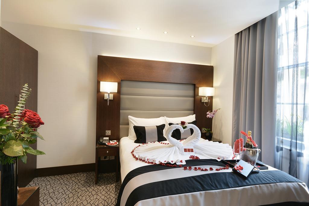 Park Grand London Lancaster Gate Londres Exterior foto A bedroom at the hotel