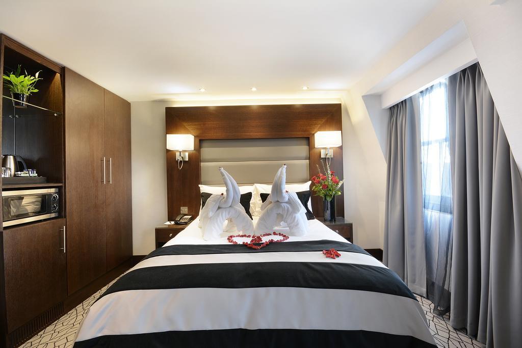 Park Grand London Lancaster Gate Londres Exterior foto A bedroom at the hotel